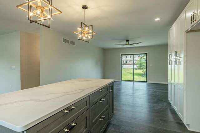 600 8th Ave, New Glarus, WI 53574 - kitchen featuring a chandelier, white cabinetry, ceiling fan, pendant lighting, and recessed lighting