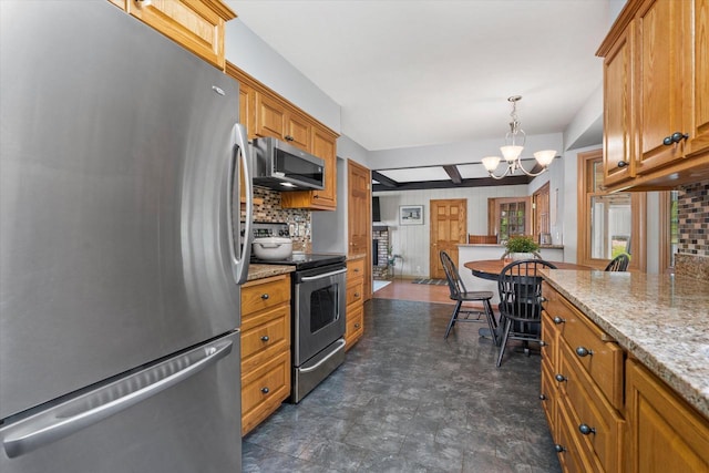 8317 S 42nd St, Franklin, WI 53132 - kitchen featuring stainless steel appliances, a chandelier, and brown cabinets