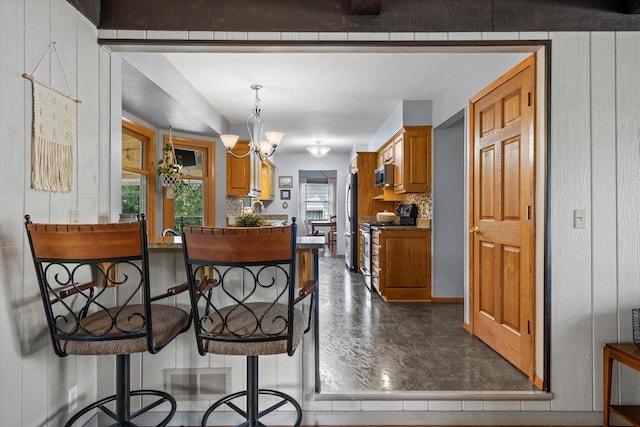 8317 S 42nd St, Franklin, WI 53132 - dining space featuring a chandelier