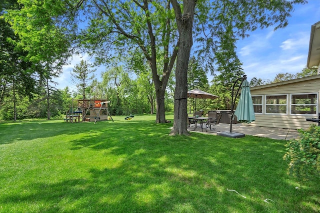 8317 S 42nd St, Franklin, WI 53132 - view of grassy yard featuring a patio area and a playground