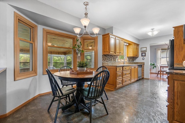8317 S 42nd St, Franklin, WI 53132 - dining area featuring baseboards and a chandelier