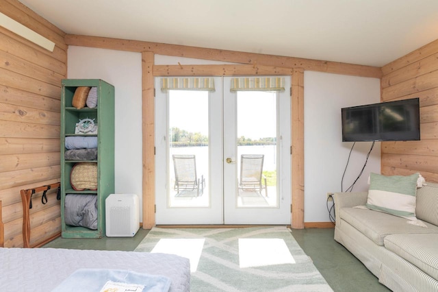 W4943 County Rd S, Horicon, WI 53032 - bedroom featuring french doors, wooden walls, and access to outside