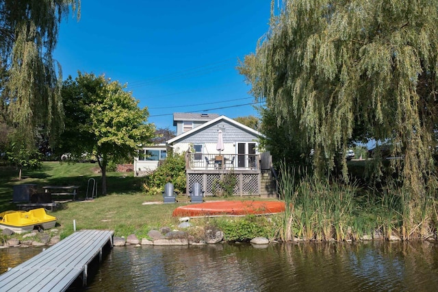 W4943 County Rd S, Horicon, WI 53032 - dock area with a lawn and a deck with water view