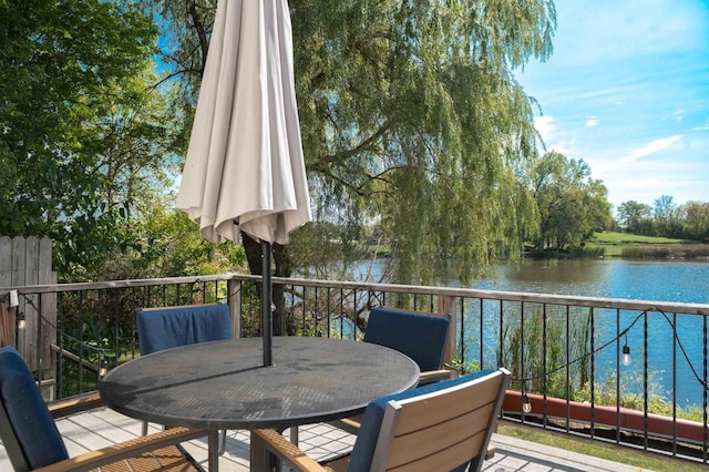 W4943 County Rd S, Horicon, WI 53032 - balcony featuring a water view and outdoor dining space