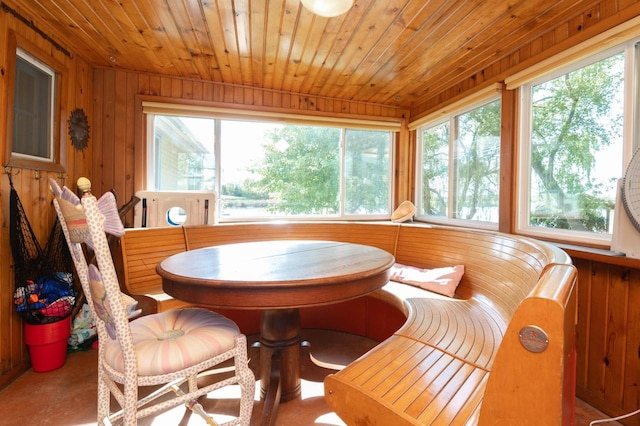 W4943 County Rd S, Horicon, WI 53032 - dining room with wooden walls, breakfast area, and wood ceiling