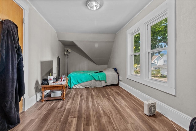 417 E Lincoln Ave, Oshkosh, WI 54901 - bedroom with wood finished floors and baseboards