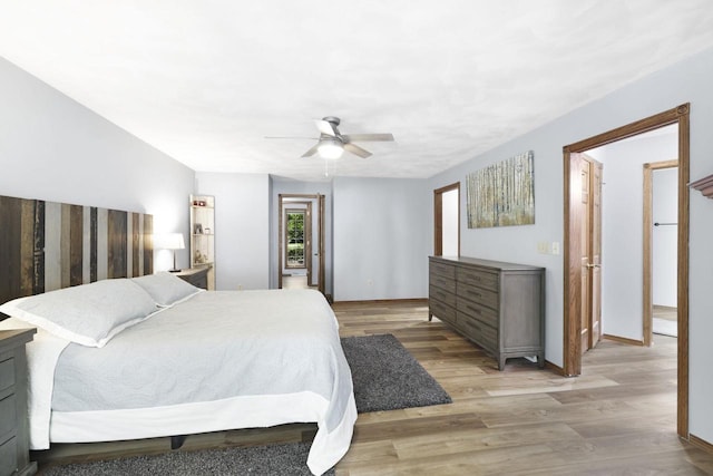 6500 E Decorah Ave, Oshkosh, WI 54902 - bedroom featuring light wood-type flooring, baseboards, and ceiling fan