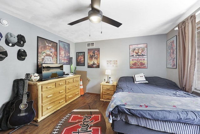 6500 E Decorah Ave, Oshkosh, WI 54902 - bedroom with dark wood-type flooring and a ceiling fan