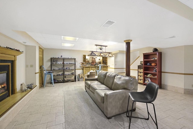 6500 E Decorah Ave, Oshkosh, WI 54902 - living room featuring a glass covered fireplace