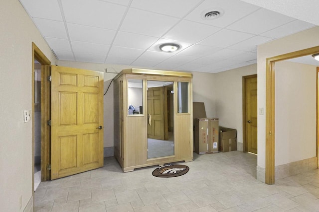 6500 E Decorah Ave, Oshkosh, WI 54902 - finished below grade area featuring a drop ceiling and baseboards