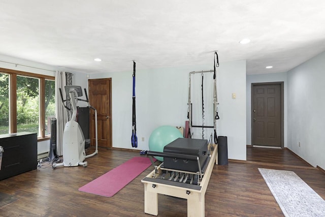 6500 E Decorah Ave, Oshkosh, WI 54902 - exercise room with recessed lighting, wood finished floors, and a baseboard radiator
