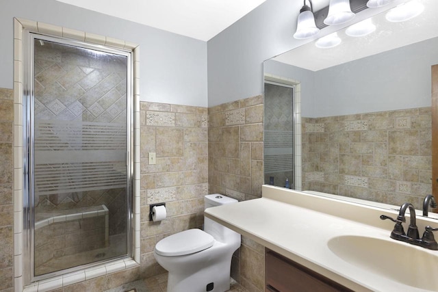 6500 E Decorah Ave, Oshkosh, WI 54902 - bathroom featuring tile walls, a shower stall, toilet, and vanity