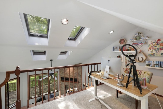 6500 E Decorah Ave, Oshkosh, WI 54902 - carpeted home office with a skylight, vaulted ceiling, and recessed lighting