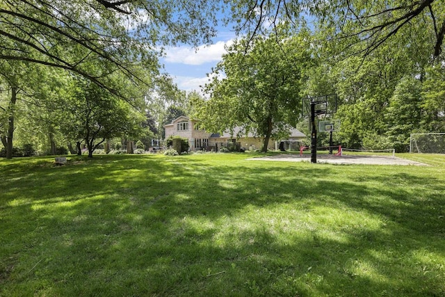 6500 E Decorah Ave, Oshkosh, WI 54902 - view of grassy yard with basketball hoop