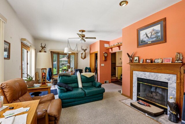 1406 E Oakwood Rd, Oak Creek, WI 53154 - carpeted living area featuring a ceiling fan and a premium fireplace