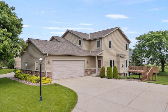 405 Century Oak Dr, Waukesha, WI 53188 - view of front of property with roof with shingles, concrete driveway, stone siding, a garage, and a deck
