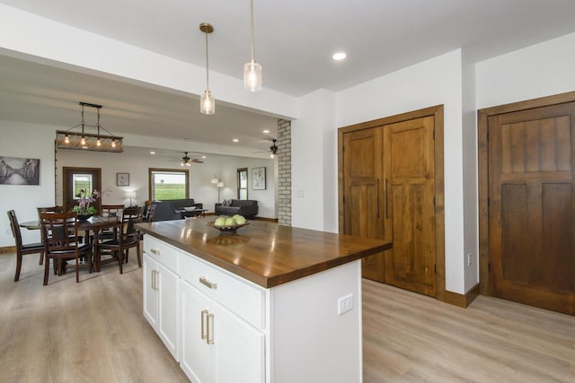 W6497 Vandre Rd, Johnson Creek, WI 53038 - kitchen with light wood-type flooring, a center island, ceiling fan, open floor plan, and recessed lighting