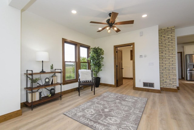 W6497 Vandre Rd, Johnson Creek, WI 53038 - sitting room with light wood finished floors, baseboards, a ceiling fan, and recessed lighting