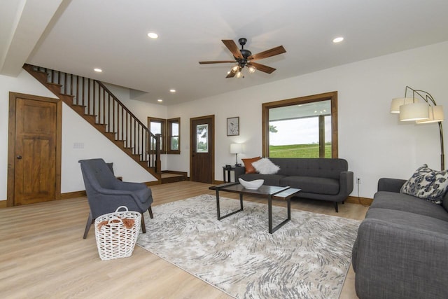 W6497 Vandre Rd, Johnson Creek, WI 53038 - living area with stairs, healthy amount of natural light, light wood-style flooring, ceiling fan, and recessed lighting