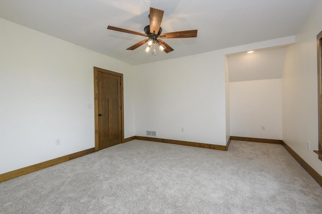 W6497 Vandre Rd, Johnson Creek, WI 53038 - unfurnished room with light colored carpet, a ceiling fan, and baseboards