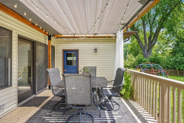 412 Frost Woods Rd, Monona, WI 53716 - deck with a playground and outdoor dining space