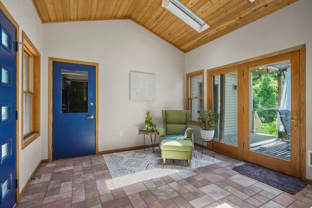 412 Frost Woods Rd, Monona, WI 53716 - foyer entrance with a skylight, wood ceiling, stone finish floors, and high vaulted ceiling