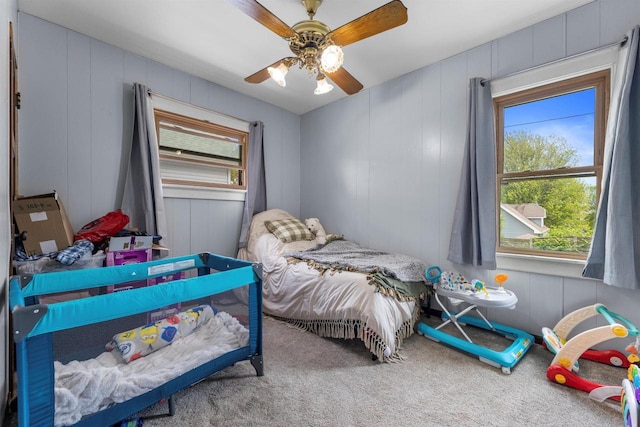 1472 S 86th St, West Allis, WI 53214 - carpeted bedroom featuring a ceiling fan and a decorative wall