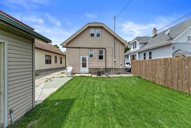 1472 S 86th St, West Allis, WI 53214 - back of house featuring a patio and cooling unit