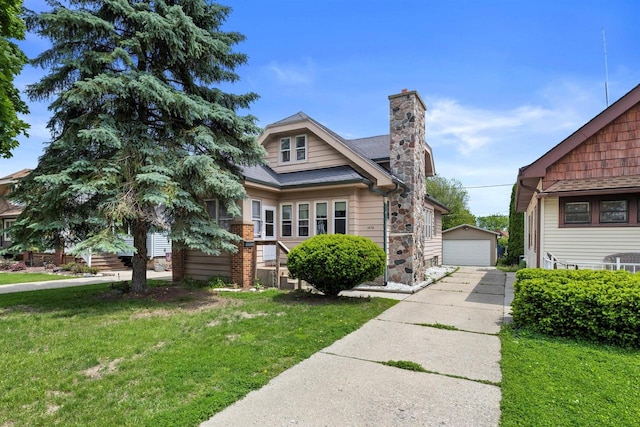 1472 S 86th St, West Allis, WI 53214 - bungalow-style home with a chimney, an outbuilding, a garage, a front lawn, and a shingled roof