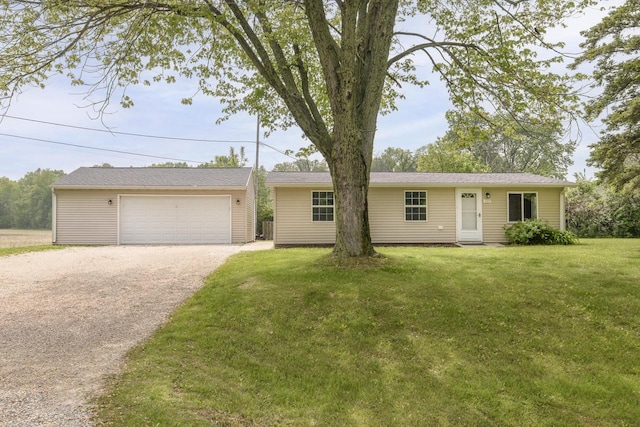 9219 Caddy Ln, Caledonia, WI 53108 - ranch-style home featuring an outdoor structure, a detached garage, and a front yard