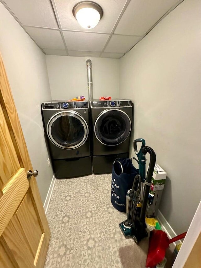 N8415 Branch Rd, Ixonia, WI 53036 - laundry room featuring baseboards and independent washer and dryer