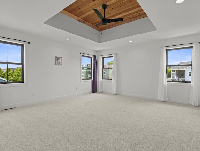 9437 Cobalt St, Middleton, WI 53562 - unfurnished room with a raised ceiling, wooden ceiling, plenty of natural light, recessed lighting, and ceiling fan
