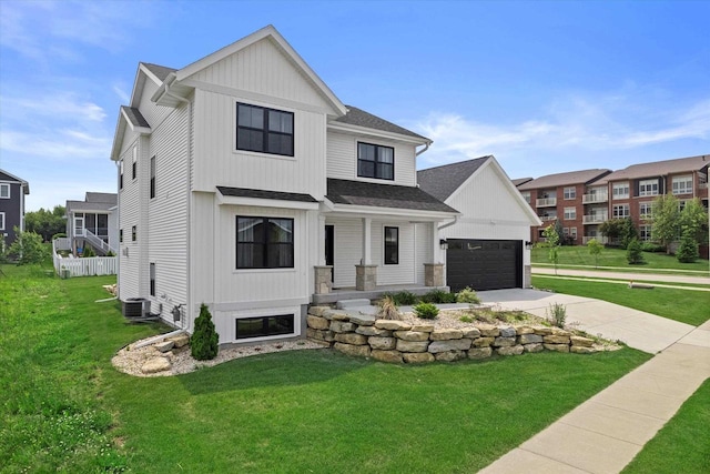 9437 Cobalt St, Middleton, WI 53562 - modern farmhouse style home featuring a porch, driveway, a front lawn, a garage, and a shingled roof