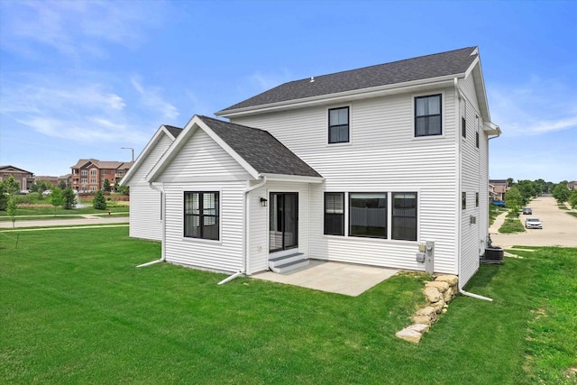 9437 Cobalt St, Middleton, WI 53562 - back of property featuring a yard, a patio area, roof with shingles, and entry steps