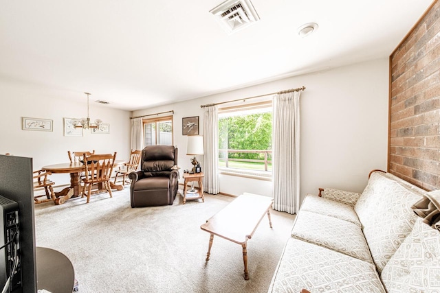 N163W19422 Cedar Run Dr Unit A6, Jackson, WI 53037 - living room featuring light colored carpet and a chandelier