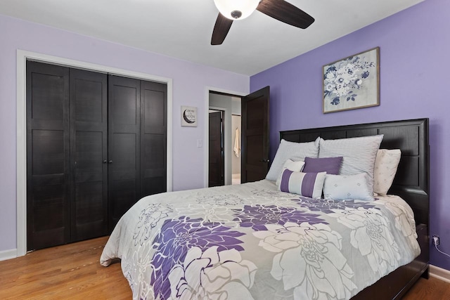12554 Knoll Rd, Elm Grove, WI 53122 - bedroom with wood finished floors, a closet, and ceiling fan