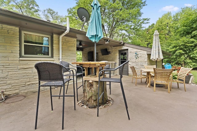 12554 Knoll Rd, Elm Grove, WI 53122 - view of patio / terrace with outdoor dining area and a ceiling fan