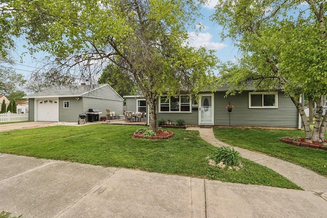 3036 S 65th Ct, Milwaukee, WI 53219 - single story home with concrete driveway, an attached garage, and an outdoor structure