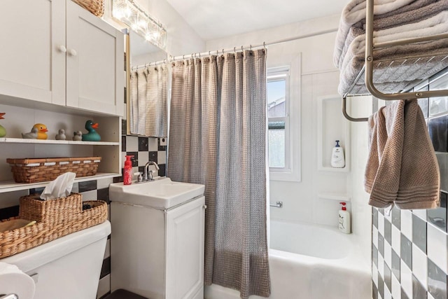 3036 S 65th Ct, Milwaukee, WI 53219 - bathroom featuring a sink, toilet, shower / bath combo with shower curtain, and plenty of natural light