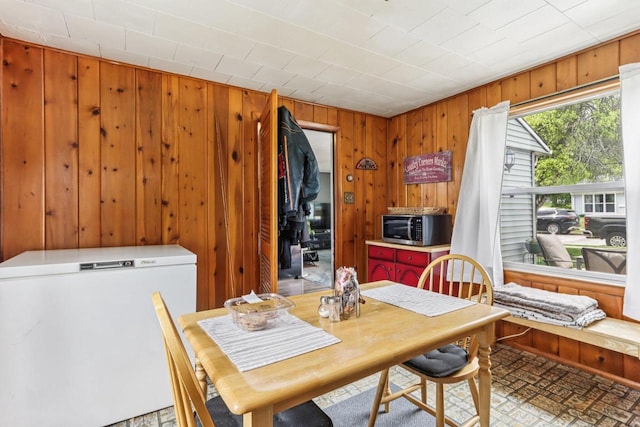 3036 S 65th Ct, Milwaukee, WI 53219 - dining space featuring wooden walls
