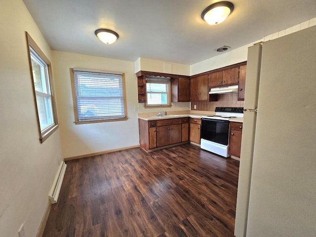9829 W Lincoln Ave, West Allis, WI 53227 - kitchen with electric range oven, freestanding refrigerator, under cabinet range hood, and light countertops