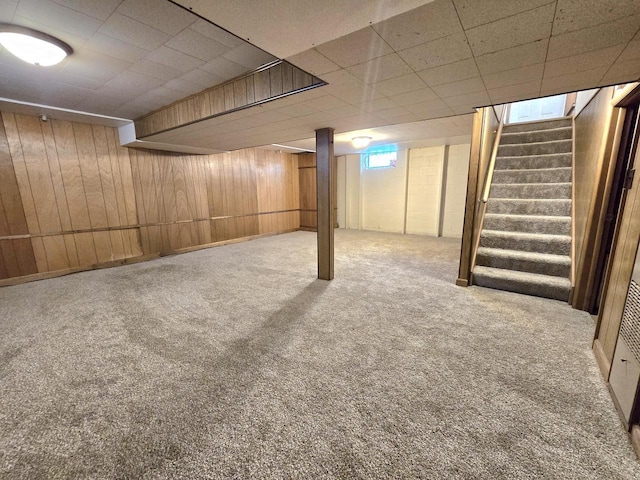 9829 W Lincoln Ave, West Allis, WI 53227 - basement featuring carpet floors, stairway, and wooden walls