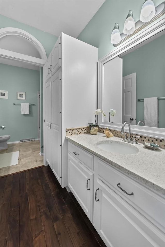 3948 Trempealeau Trl, Verona, WI 53593 - bathroom with vanity, wood finished floors, and toilet