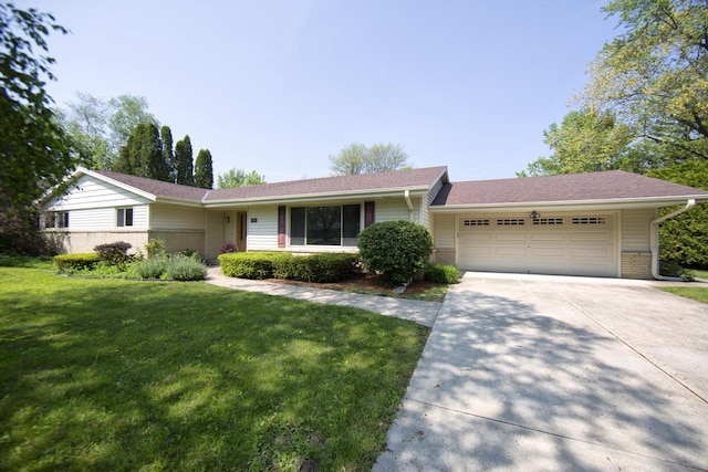 8680 N Point Dr, Fox Point, WI 53217 - ranch-style house featuring an attached garage, brick siding, concrete driveway, a front lawn, and roof with shingles