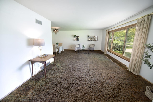 8680 N Point Dr, Fox Point, WI 53217 - living room with carpet floors and a chandelier