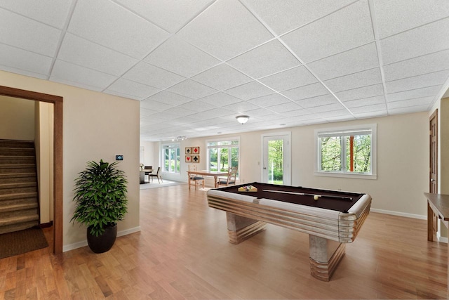 100 Accipiter Ct, Burlington, WI 53105 - rec room with pool table, a paneled ceiling, light wood-type flooring, and baseboards