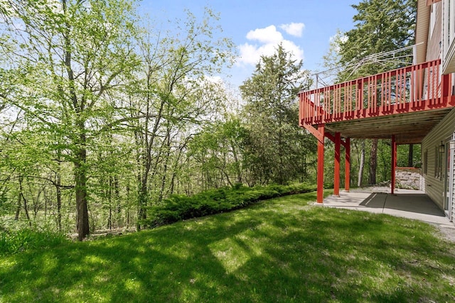 100 Accipiter Ct, Burlington, WI 53105 - view of grassy yard featuring a patio and a wooden deck