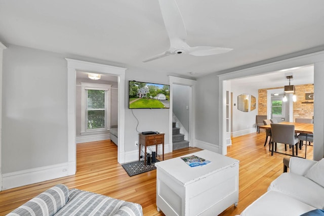 170 N Lakeshore Dr, Fontana, WI 53125 - living area featuring light wood finished floors, plenty of natural light, and a ceiling fan