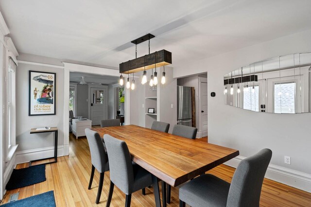 170 N Lakeshore Dr, Fontana, WI 53125 - dining room featuring baseboards and light wood finished floors