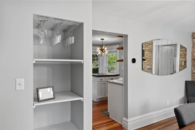170 N Lakeshore Dr, Fontana, WI 53125 - corridor featuring wood finished floors and baseboards